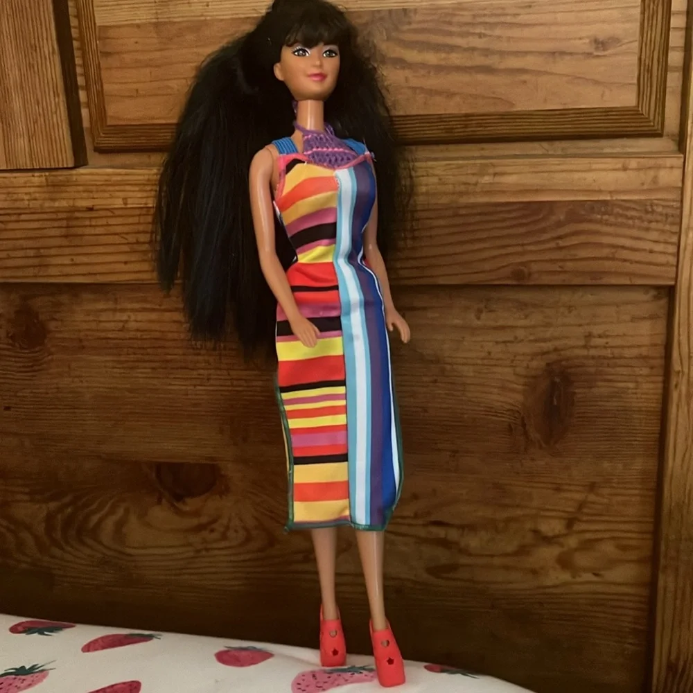 Pearl Beach Kira Barbie Doll with Black Hair two outfits